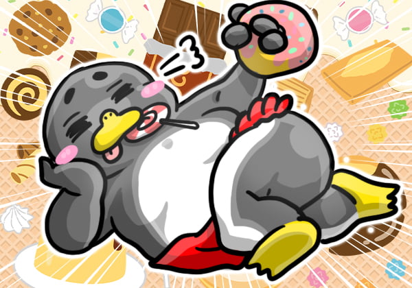 お菓子の暴食をするペンギンの画像
